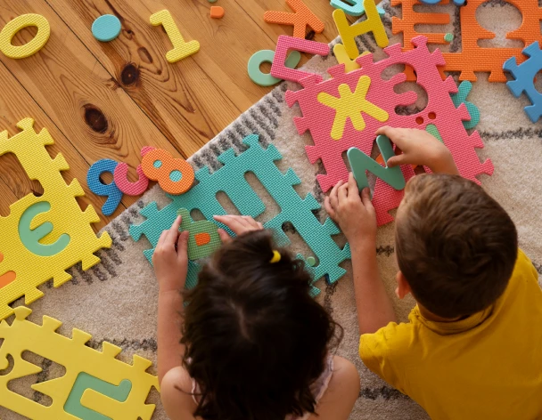 siblings-playing-with-brain-teaser-toys